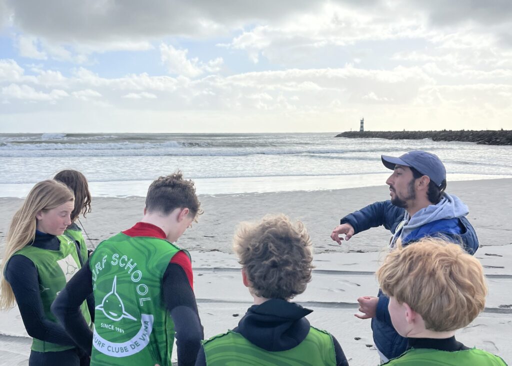surf coach coaching at the beach